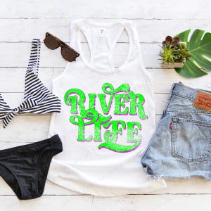 May include: White tank top with a green and purple distressed graphic that says "River Life".