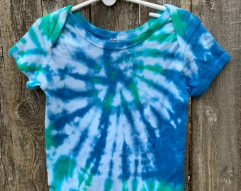 Tie Dyed Cerulean Blue and Irish Green Spider Web Short Sleeve Onesie In Stock and READY TO SHIP