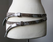 Items similar to skinny double leather belt - cow hide, silver animal print on Etsy