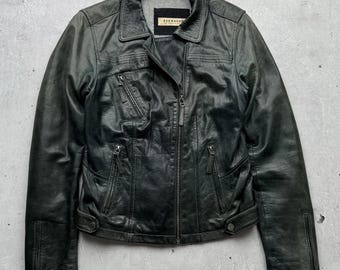 May include: A black leather jacket with a zipper closure and multiple pockets. The jacket has a  "Barkwood" label on the inside.