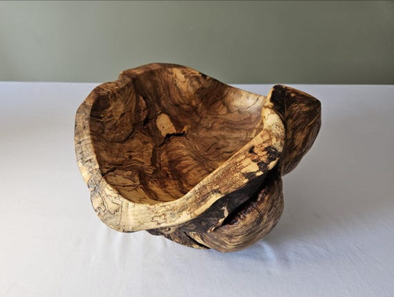 Spalted maple burl means no two are alike — the natural fungal coloring creates wild abstract patterns that look like a painting grew inside the wood.
