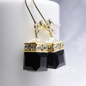 crystal cube dangle earrings in black onyx with gold rhinestone crowns on top and set on gold leverback earring closure