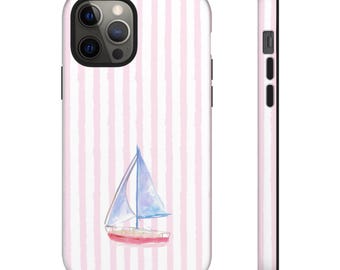 May include: A smartphone case featuring a watercolor illustration of a sailboat with a blue sail and a red hull, set against a background of vertical light pink and white stripes. The case includes cutouts for the camera and side buttons.