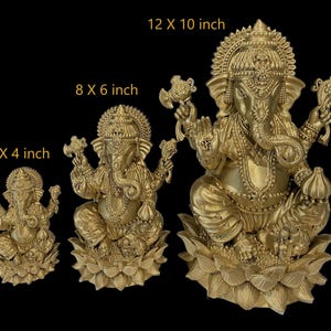 May include: Three gold-colored Ganesha statues of varying sizes, each sitting on a lotus base. The statues are 5 x 4 inches, 8 x 6 inches, and 12 x 10 inches.