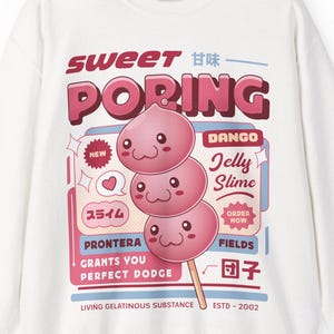 May include: White sweatshirt featuring a graphic of three pink, smiling dango on a stick, with the text "SWEET PORING" and other Japanese text. The design includes the words "Jelly Slime" and "PRONTERA GRANTS YOU PERFECT DODGE".