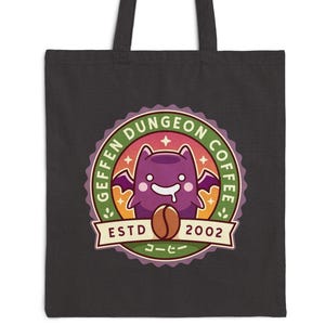 May include: Black tote bag featuring a colorful circular graphic with the text "GEFFEN DUNGEON COFFEE" around a purple cartoon monster holding a coffee bean. The graphic also includes the text "ESTD 2002" and Japanese text.