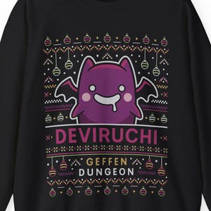 May include: Black sweatshirt featuring a purple cartoon bat with the text "DEVIRUCHI GEFFEN DUNGEON". The design includes a festive pattern with hanging ornaments in pink, yellow, and green. A fun and unique graphic apparel item.