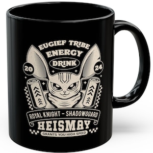 May include: Black ceramic mug with a graphic design. The design features a stylized cat-like creature with large ears, the text "EUGIEF TRIBE ENERGY DRINK", and the name "HEISMAY". The mug also has the text "GRANTS YOU HIGH SPEED".