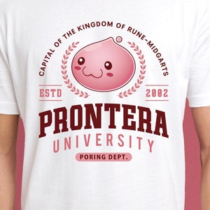 May include: White t-shirt with a maroon and pink graphic. The graphic features a pink cartoon character inside a laurel wreath, with the text "CAPITAL OF THE KINGDOM OF RUNE-MIDGARTS" above it. Below, it reads "PRONTERA UNIVERSITY PORING DEPT."