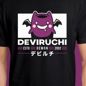 May include: Black t-shirt with a white graphic of a purple cartoon monster with wings and the text "DEVIRUCHI III ESTD III DEMON III 2002 III - デビルチ - "