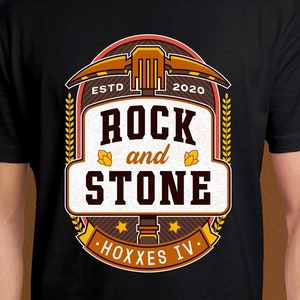 May include: Black t-shirt with a vintage-style logo featuring a pickaxe, wheat stalks, and the text "Rock and Stone.  ESTD 2020. HOXXES IV."