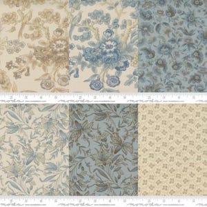 May include: A collection of six fabric swatches featuring floral and botanical patterns in shades of blue, beige, and cream. A white measuring tape is visible across the center, showing a width of approximately 10 inches for each swatch.