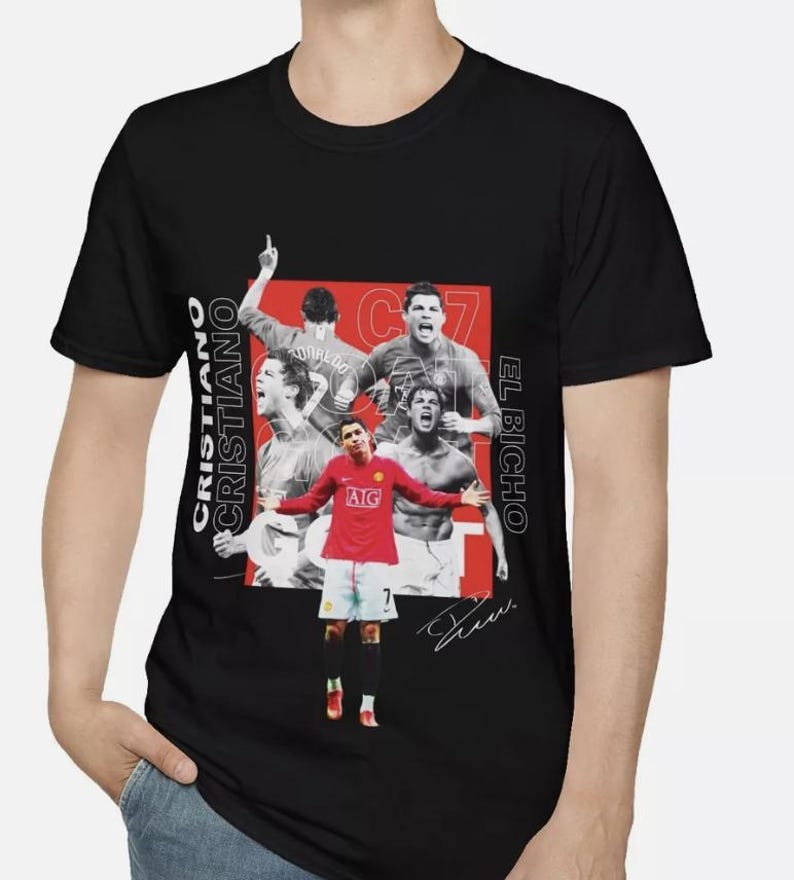 May include: Black t-shirt featuring a graphic of Cristiano Ronaldo in a red soccer uniform, with the text "CRISTIANO" and "EL BICHIO". The design includes multiple images of Ronaldo in action, with his signature.