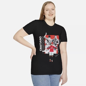 May include: Black t-shirt featuring a collage of images of Cristiano Ronaldo in action, with the name "Cristiano" printed vertically in white. The design includes a signature and red accents.