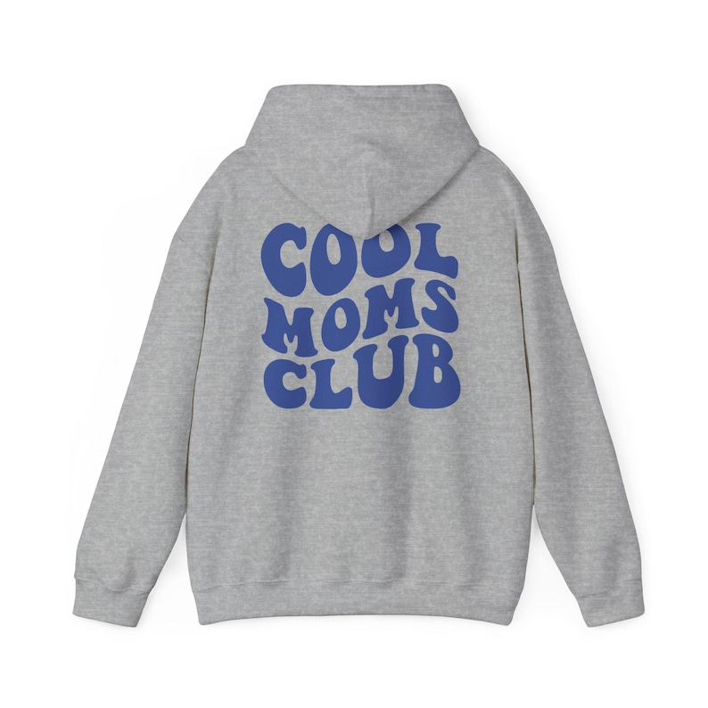 May include: Gray hooded sweatshirt with the text "COOL MOMS CLUB" in blue, retro-style lettering on the back.