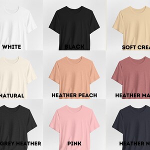 May include: Nine different color t-shirts, including white, black, soft cream, natural, heather peach, heather mauve, dark grey heather, pink, and heather navy.
