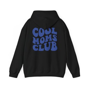 May include: Black hooded sweatshirt with a blue "Cool Moms Club" graphic on the back.