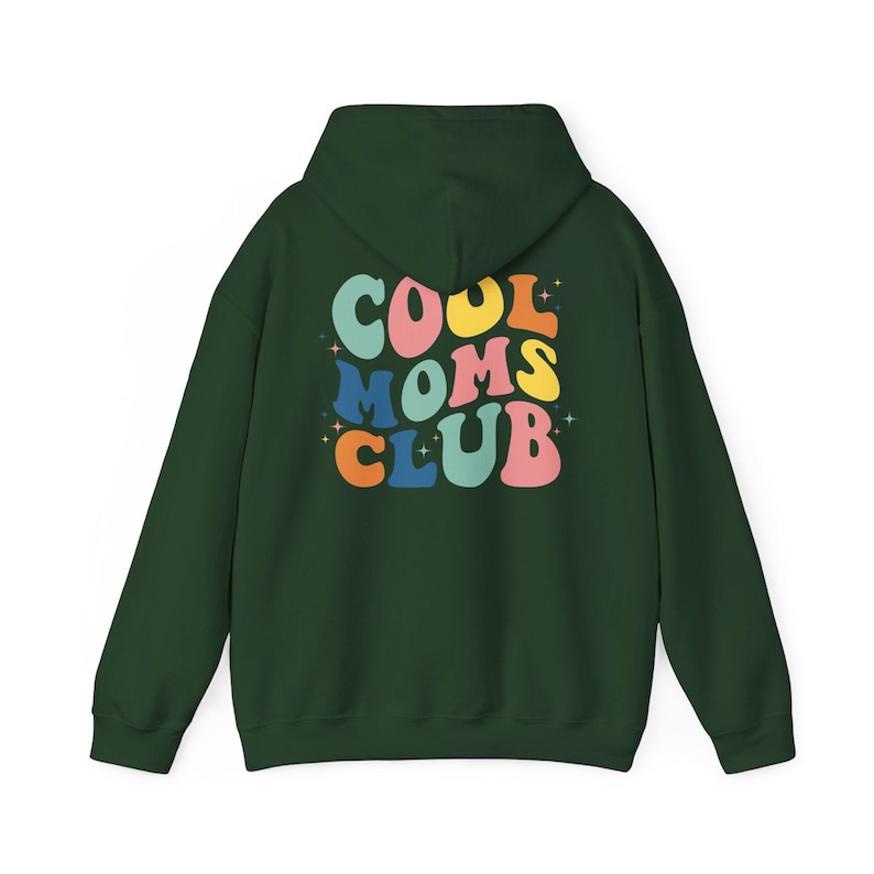 May include: A dark green hooded sweatshirt with the text "COOL MOMS CLUB" in colorful, retro-style lettering on the back.