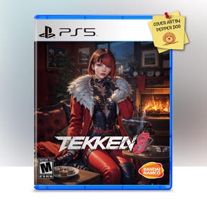May include: A blue PlayStation 5 game case with a red and black image of a woman in a red coat and black outfit. The game is called "Tekken 8" and the case has a "M" rating. The background is a fireplace with a red brick surround.
