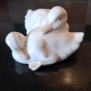 NAO by Lladro,  pair of white ducks, one sleeping.  vintage collectible.