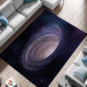 May include: A black and purple rug with a swirling galaxy design featuring a large black hole in the center. The rug is perfect for adding a touch of space to any room.