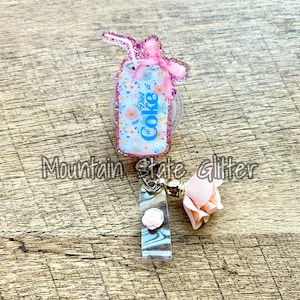Diet cola acrylic badge reel