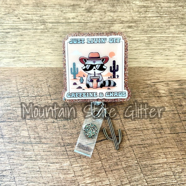 Just livin off caffeine and chaos raccoon acrylic badge reel