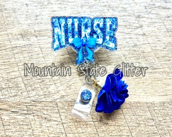 Blue floral coquette nurse acrylic badge reel