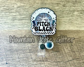 Just a little ray of pitch black acrylic badge reel