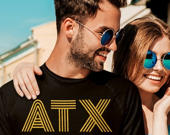 AtX Shirt, Unisex in Nero / Navy / Dark Heather • Design retrò in stile vintage in giallo sole, regalo Austin Texas, camicia Austin TX