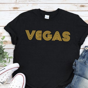 Camisa VEGAS, unisex en negro/azul marino/brezo oscuro • Gráfico grande amarillo sol en estilo retro de Las Vegas de los años 60/70, diseño de viaje a Las Vegas