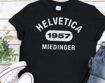 HELVETICA Graphic Designer Gift Shirt, Unisex • Vintage / athletic style / funny design for professional designer, illustrator, art director