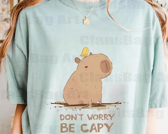 Capybara Unisex Tee: &#39;Dont worry be capi&#39;, Premium Quality Comfort Shirt, Carefree Vibes Clothing, Casual Graphic Tee, Animal Lover