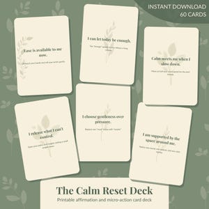 May include: A set of six affirmation cards with rounded corners, featuring botanical illustrations and phrases like "Ease is available to me now." The cards are cream-colored with dark text and a green background. The text "The Calm Reset Deck" is at the bottom.