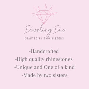 May include: A pink and gray logo for a business called "Dazzling Duo" that is crafted by two sisters. The logo features a diamond with rays of light emanating from it. The text "Handcrafted", "High quality rhinestones", "Unique and One of a kind", and "Made by two sisters" is also included in the image.