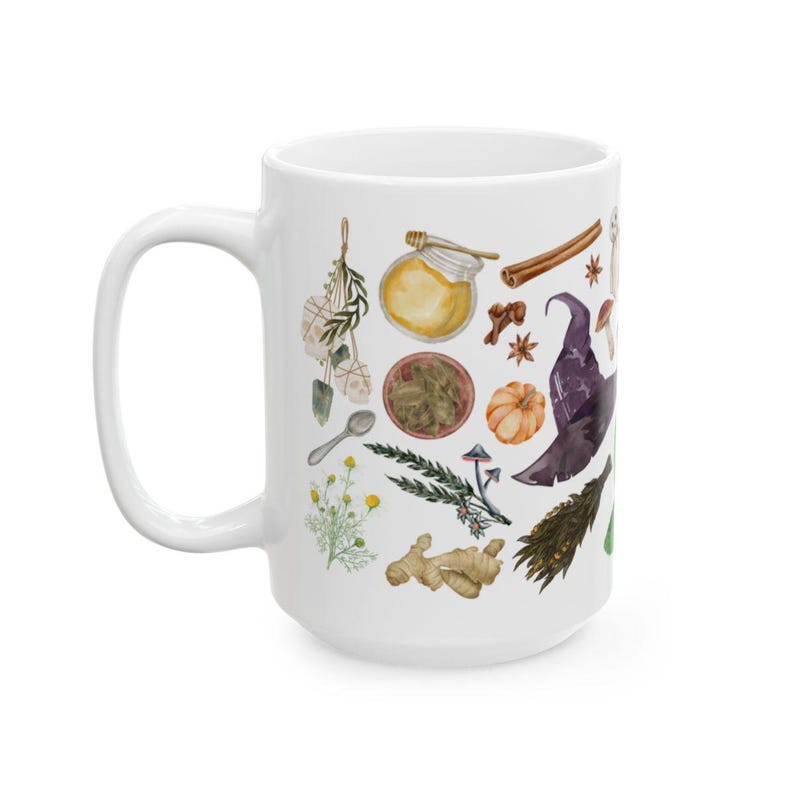 May include: White ceramic mug with a colorful illustration of various herbs, spices, mushrooms, and a witch's hat. The design is reminiscent of a potion or spell-making scene.