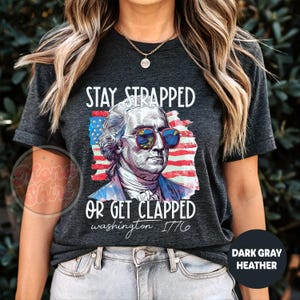 Stay Strapped Or Get Clapped Shirt, George Washington Funny Tee, USA Flag Shirt, 2nd Amendment Shirt, Patriotic July 4th Gift, America Shirt