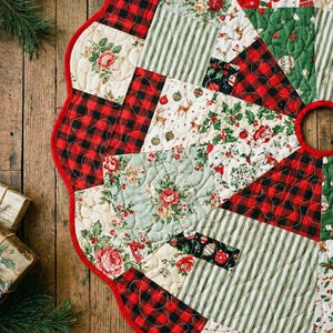 May include: A circular quilted Christmas tree skirt featuring a patchwork design of red and black buffalo plaid, green and white stripes, and cream fabric with floral, reindeer, and holiday ornament prints, finished with a red scalloped edge.