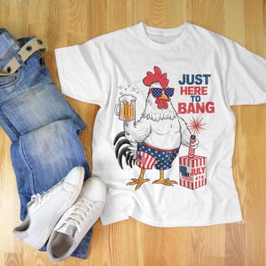 May include: White t-shirt with a cartoon rooster wearing sunglasses and holding a beer. The rooster is wearing red, white, and blue swim trunks and holding a firework. The text "Just Here To Bang" is printed on the shirt.