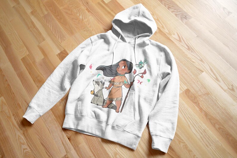 May include: White hooded sweatshirt with a colorful cartoon illustration of a Native American girl with long black hair, wearing a brown dress and holding a stick. A raccoon is standing next to her.