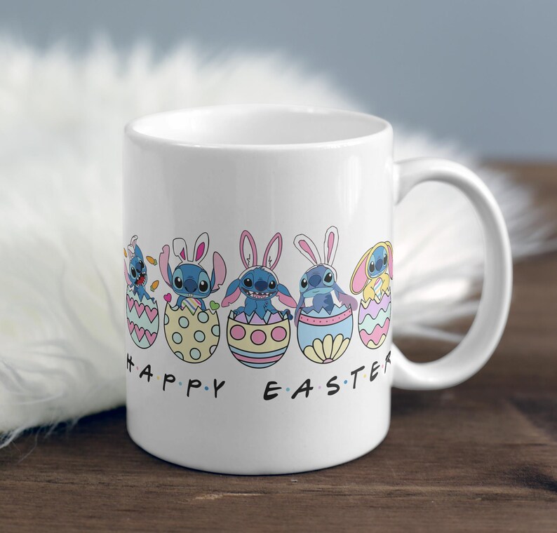 May include: White ceramic mug with a colorful design of Stitch characters from Lilo & Stitch dressed as Easter bunnies and holding Easter eggs. The text "Happy Easter" is printed on the mug.