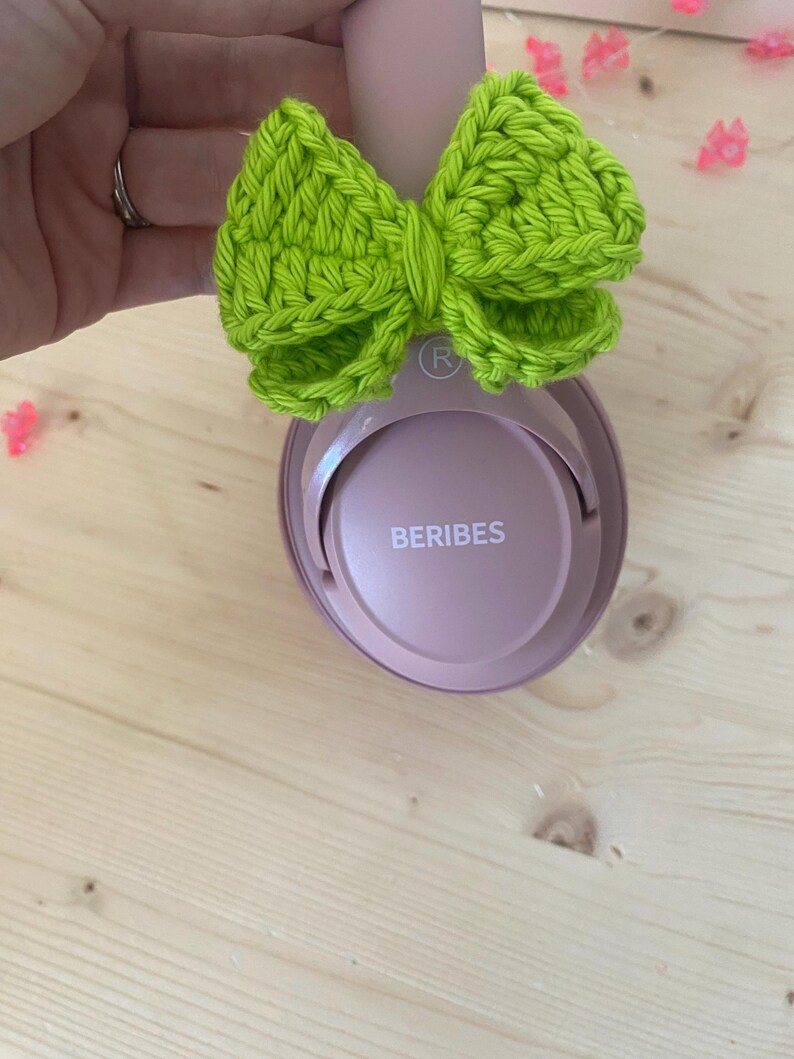 Bright green headphone bow accessories. Neon green color.