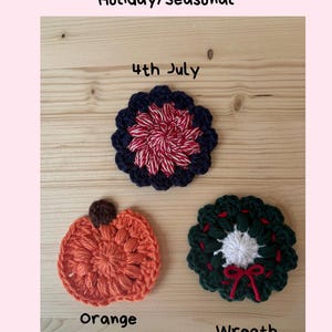 May include: Three crocheted coasters labeled Holiday/Seasonal. One is a 4th of July design with red and white center and navy border. One is an orange pumpkin with a brown stem. One is a green wreath with a white center and a small red bow.