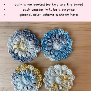 May include: Four round, crocheted coasters featuring a floral-inspired puff stitch design. The yarn is variegated in shades of blue, yellow, white, and grey. The text at the top reads: Paris in June Coasters, yarn is variegated (no two are the same), each coaster will be a surprise, general color scheme is shown here.