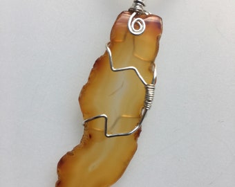 Wire-Wrapped Agate Pendant, Silver Toned Wire, Yellow Orange Stone, Polished Stone Necklace by RavenstoneHandcrafts