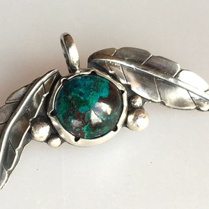 Handcrafted Sterling Silver Chrysocolla Pendant: Leaf Accents