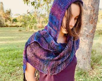 The Flowmad - a handspun and woven piece with a hoodie knitted and crocheted onto it.