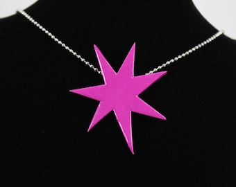 May include: A pink star-shaped pendant necklace with a silver chain.
