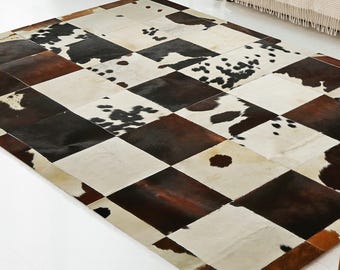 Rundleer patchwork vloerkleed, tapijt van echt kalfsleer, handgemaakt
