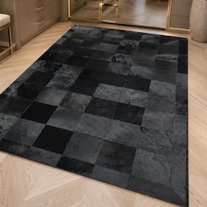 Schwarz-grauer Patchwork-Teppich aus Rindsleder - Handgemachter Teppich aus echtem Leder